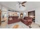Spacious living room opens to the kitchen, featuring comfortable seating and plenty of natural light at 3442 Beech Trl, Clearwater, FL 33761