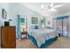 Serene main bedroom with comfortable furniture and serene views from the window at 3442 Beech Trl, Clearwater, FL 33761