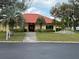 This is a view of the community clubhouse, which offers residents gathering space at 37542 Pinata Ave, Zephyrhills, FL 33541