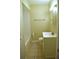 Bathroom featuring tile flooring, a vanity with a mirror and a tiled shower and tub at 3905 W Carmen St, Tampa, FL 33609