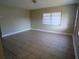 Inviting living room with neutral walls and tile flooring at 3905 W Carmen St, Tampa, FL 33609