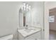Bathroom features marble countertops, chrome fixtures and decorative lighting at 4005 W Nassau St, Tampa, FL 33607