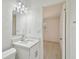 Updated bathroom vanity, sink, and modern lighting, showcasing a clean and inviting space at 4005 W Nassau St, Tampa, FL 33607