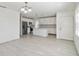 Modern kitchen with stainless steel appliances, an island, and an open layout at 4005 W Nassau St, Tampa, FL 33607