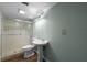 Clean and functional bathroom with a glass-enclosed shower and modern fixtures at 426 32Nd N Ave # 102E, St Petersburg, FL 33704