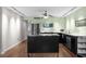 Bright, open kitchen featuring stainless steel appliances and a functional center island at 426 32Nd N Ave # 102E, St Petersburg, FL 33704