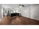 Spacious kitchen boasts wood floors, stainless appliances, and abundant natural light at 426 32Nd N Ave # 102E, St Petersburg, FL 33704