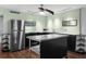 Stainless steel appliances shine in this well-lit kitchen, complemented by quartz counters at 426 32Nd N Ave # 102E, St Petersburg, FL 33704