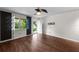 Well lit open concept area with wood floors, and abundant natural light at 426 32Nd N Ave # 102E, St Petersburg, FL 33704