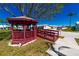 Community gazebo beside the street and grassy area; great spot to relax at 5427 Springwood Blvd # 5427, Pinellas Park, FL 33782