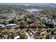 An aerial view showcasing the property amidst a tranquil, tree-filled neighborhood with beautiful views at 6327 Emerson S Ave, St Petersburg, FL 33707