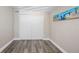 Neutral bedroom with a closet and artwork at 6327 Emerson S Ave, St Petersburg, FL 33707