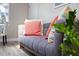 Cozy living room featuring a modern couch, neutral wall colors, and hardwood floors at 6327 Emerson S Ave, St Petersburg, FL 33707