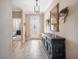 Inviting foyer with wood-look tile floors and stylish decor at 7515 37Th E Ave, Palmetto, FL 34221