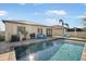 Backyard pool area with brick pavers and an outdoor barbecue grill at 7515 37Th E Ave, Palmetto, FL 34221