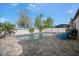 Backyard pool area with brick pavers and white fence at 7515 37Th E Ave, Palmetto, FL 34221