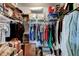 Well-organized walk-in closet featuring rods and shelves for ample storage and organization at 9769 86Th Ave # 9769, Seminole, FL 33777