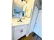 Bathroom featuring a new sink, vanity, mirror, and hardware at 10320 White Cedar St, Port Richey, FL 34668