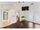 Bedroom with hardwood floors and a door at 1037 Jamaica Way, Tarpon Springs, FL 34689