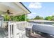 Outdoor deck area with a barbecue grill, perfect for cooking and outdoor gatherings with a view at 1037 Jamaica Way, Tarpon Springs, FL 34689