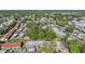 Wide-angle aerial view of community featuring residences, mature trees, and lush landscaping at 11511 113Th St # 22E, Largo, FL 33778