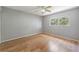 Light filled bedroom has updated floors and neutral wall color at 11511 113Th St # 22E, Largo, FL 33778