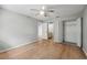 Bedroom featuring updated floors, neutral wall color, and closet at 11511 113Th St # 22E, Largo, FL 33778