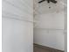 Walk-in closet offers ample storage with wire shelving at 11511 113Th St # 22E, Largo, FL 33778