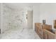 Elegant bathroom featuring a marble shower, dual vanities, and designer fixtures at 116 19Th Se Ave, St Petersburg, FL 33705