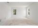 Bright bedroom with ample natural light featuring a neutral color scheme and large windows at 116 19Th Se Ave, St Petersburg, FL 33705
