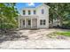 Charming two-story home featuring a classic design and freshly landscaped front yard at 116 19Th Se Ave, St Petersburg, FL 33705