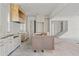 Open-concept kitchen with unfinished cabinets, island, and layout for modern appliances at 116 19Th Se Ave, St Petersburg, FL 33705
