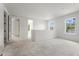 Open loft area with abundant natural light featuring neutral color scheme and several windows at 116 19Th Se Ave, St Petersburg, FL 33705