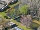 An aerial view of a neighborhood on the water with a foot bridge at 11719 Boynton Lane, New Port Richey, FL 34654