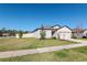 Charming single-story home with a well-manicured front lawn and attached garage at 12103 Gothic Rd, Spring Hill, FL 34610