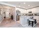 Open kitchen featuring stainless steel appliances, granite countertops, and island with seating at 12103 Gothic Rd, Spring Hill, FL 34610