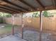 View of the fenced backyard featuring a patio and a fire pit area at 12611 Touchton Dr # 122, Tampa, FL 33617