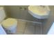 Powder room with a square sink and tile flooring at 12611 Touchton Dr # 122, Tampa, FL 33617
