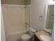 Bathroom features a shower-tub combo, vanity, and mirror at 12611 Touchton Dr # 122, Tampa, FL 33617