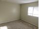 Bedroom featuring neutral carpet and a bright window at 12611 Touchton Dr # 122, Tampa, FL 33617