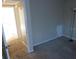 Cozy bedroom featuring neutral carpet and a door leading to a hallway at 12611 Touchton Dr # 122, Tampa, FL 33617