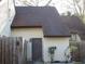 Charming exterior of the townhouse with a brown door and matching brown roof at 12611 Touchton Dr # 122, Tampa, FL 33617