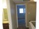 Hallway leading to a bathroom and bedroom at 12611 Touchton Dr # 122, Tampa, FL 33617