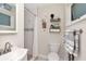 Bathroom with updated vanity, new fixtures and tiled shower at 13596 Croft N Dr, Largo, FL 33774