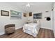 Bedroom with wood flooring, ceiling fan, and natural light at 13596 Croft N Dr, Largo, FL 33774