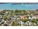 Wide aerial view captures upscale homes near inter-coastal waterway with a lush canopy of trees at 1433 Park N St, St Petersburg, FL 33710