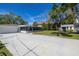 Spacious yard featuring a shed and screened in porch at 1433 Park N St, St Petersburg, FL 33710