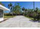 Large, open backyard area with lush lawn and mature trees at 1433 Park N St, St Petersburg, FL 33710