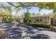 Charming single-story home with lush landscaping, inviting front porch, and a well-maintained driveway at 1433 Park N St, St Petersburg, FL 33710