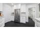 Bright kitchen features stainless steel appliances, quartz countertops, and white cabinets at 1433 Park N St, St Petersburg, FL 33710